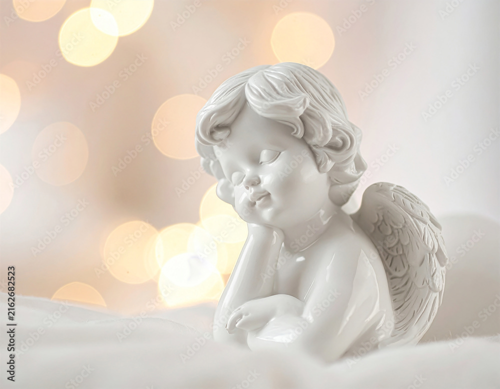 Fototapeta premium Little white angel – plaster figurine