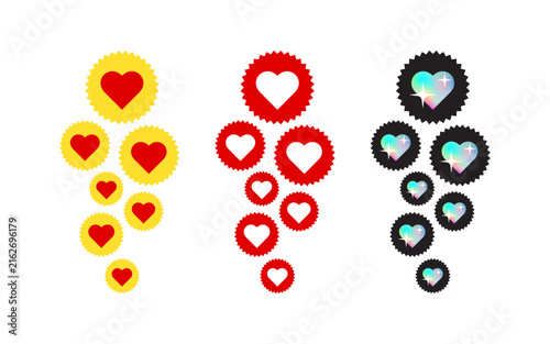 Collection of stylized heart badges in red, yellow, and holographic designs