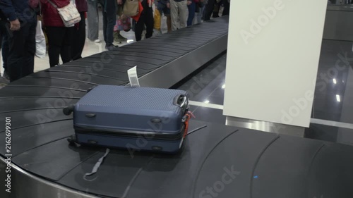 Airport baggage conveyor, suitcases are being transported around, travel, 4k