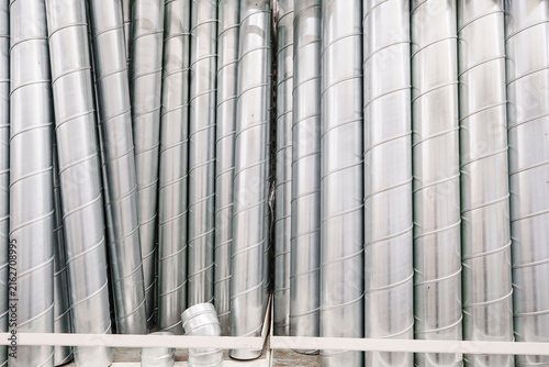 Konstfotografi Spiral Galvanized Metal Ventilation Pipes on Store Shelf