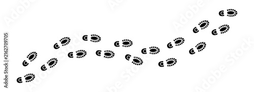 Foto Black shoe print trail isolated on white background showing a path of footprints