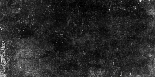 Dark and Grungy Texture A stark, monochrome image showcases a heavily distressed, grunge-like texture with visible imperfections, scratches, and splotches, evoking a sense of age and decay.