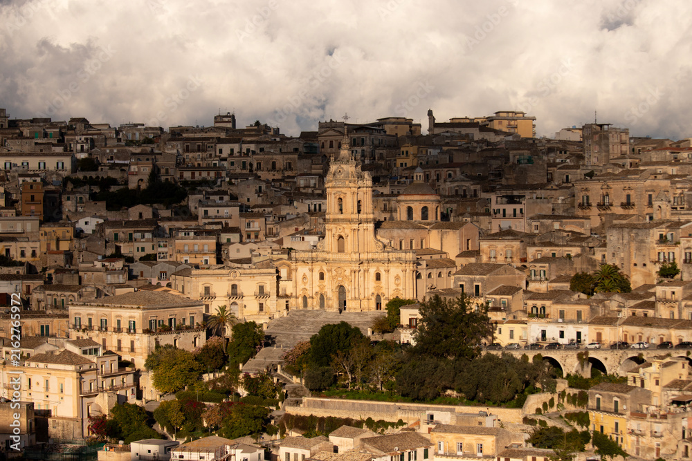 Fototapeta premium Modica, Italy; 1st August 2026: The Cathedral of San Giorgio, an icon of Sicilian Baroque in the Val di Noto on the island of Sicily.