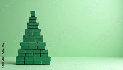 Christmas Tree Built from Stacked Green Gift Boxes