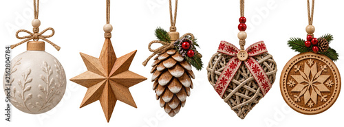Elegant Scandinavian-style wooden Christmas ornaments, suspended on thin threads, include a ball, star, and pine cone, on transparent background. Set of luxurious holiday decorations for the New Year.