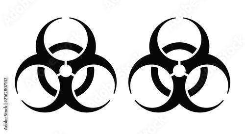 Bild auf Leinwand Biohazard symbol silhouettes against a white background two instances
