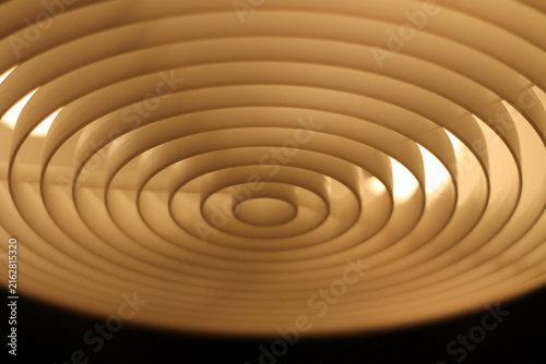 Warm Concentric Ceiling Lamp Abstract Pattern With Modern Circular Rings And Soft Ambient Light