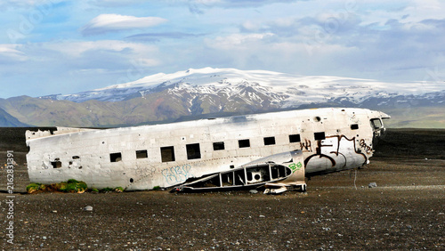 Fotografie Airplane wreck on the beach in Iceland, abstract scene in landscape