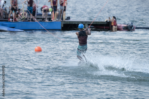 Wakeboarder Riding Through Water with Dynamic Splash
