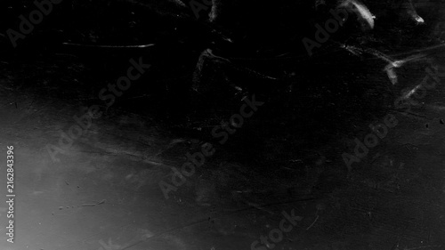 фотографія Vintage film grain texture, dark monochromatic overlay with dust and scratches,