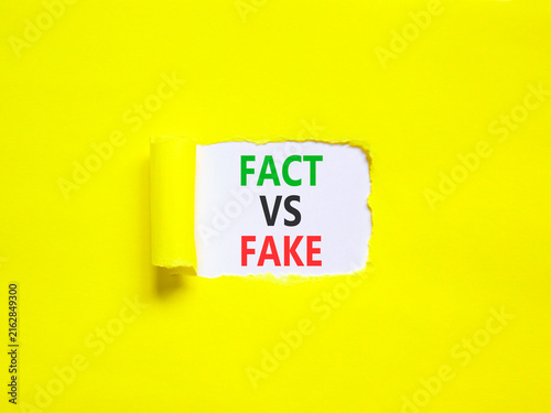 Принти на полотні Fact vs versus fake words symbol