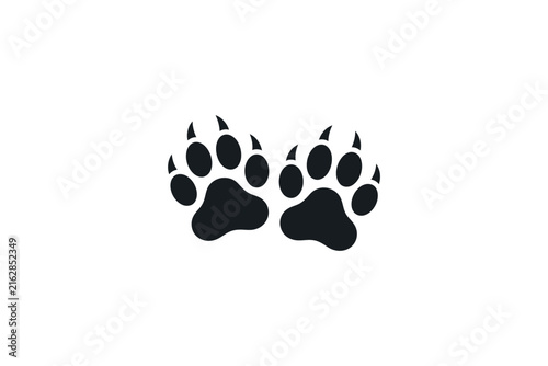 Black wild animal paw prints with sharp claws vector silhouette illustration.