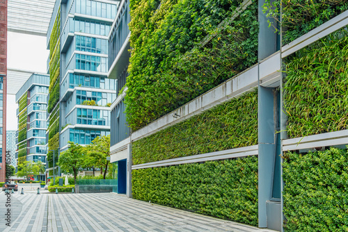 Obraz na plátně Modern architecture with green wall and landscaped pedestrian space in Shenzhen city, China