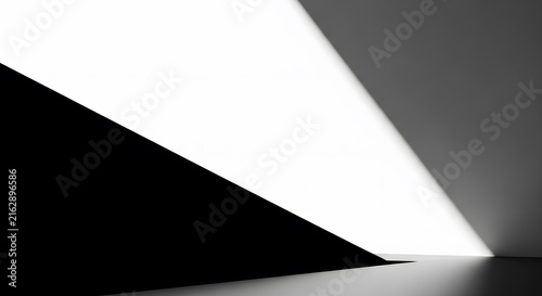Abstract minimalist composition with sharp geometric shapes in black and white light