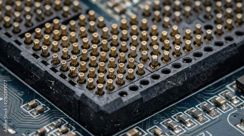 Close up of a computer processor socket on a motherboard.