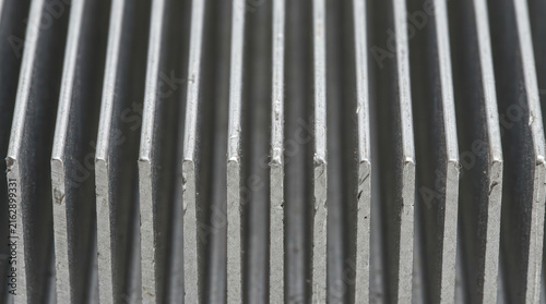 Close up of a metal heat sink with many fins 1.