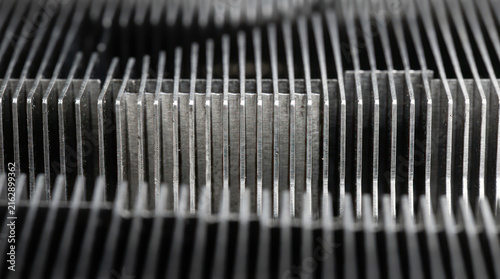 Close up of a metal heatsink with fins for cooling electronics 1.