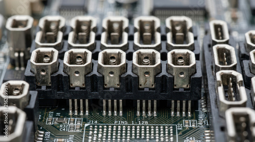 Close up of computer motherboard SATA ports and connectors.