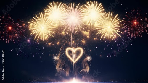 Romantic Heart Shaped Fireworks Exploding in Night Sky Celebration.