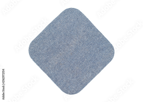 Blue square denim patch with rounded corners isolated on white.