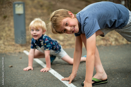 Foto Playful children enjoying outdoor fun.