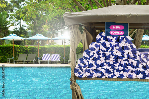 Stacked new, freshly towels at swimming pool.