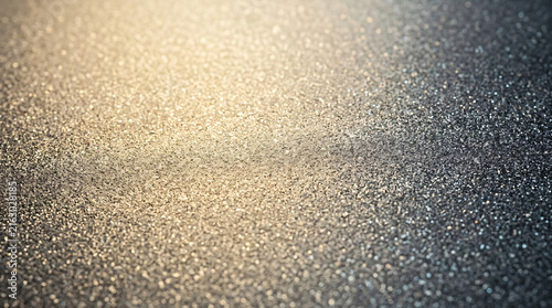 Abstract Textured Metallic Surface With Champagne Gold Glow And Shimmering Dark Glitter Bokeh