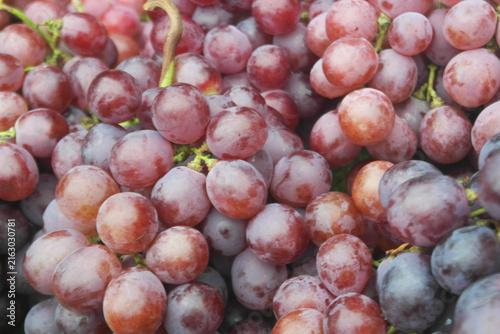 Fresh grapes close up as background	