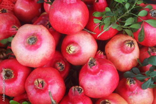 Fresh ripe pomegranate fruits close up as background	