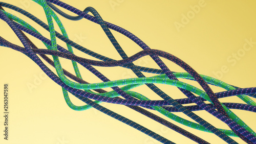 3d render of climbing rope against a bright yellow background.
