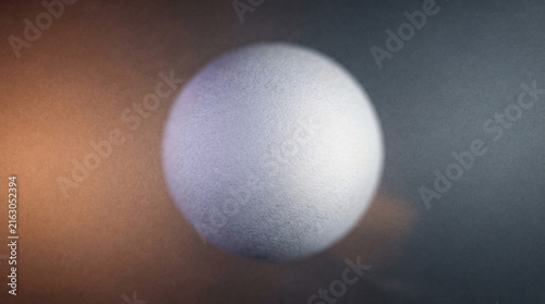 Abstract Textured Sphere Transitioning Between Violet And White On A Warm And Cool Gradient Background