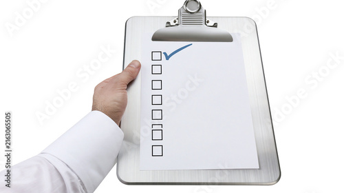Obraz na plátně Clipboard with checklist and blue checkmark held by hand