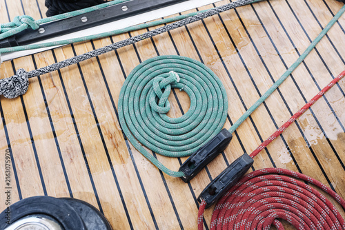 Canvastavla Coiled sailing ropes on wooden deck