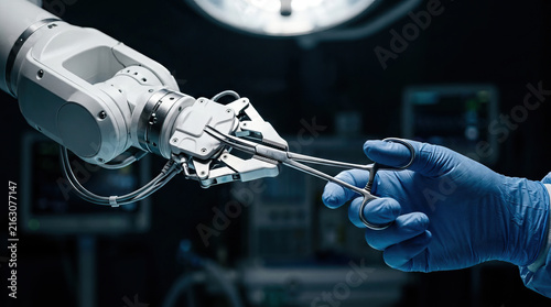 Robotic gripper handing surgical instrument to gloved hand in modern operating room, demonstrating precision, medical automation, and advanced healthcare technology