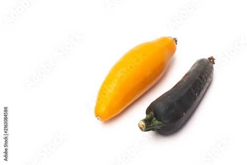 Canvas Print Fresh green and yellow zucchini, or courgettes, arranged side by side in similar sizes, highlighting their natural color variation and smooth texture