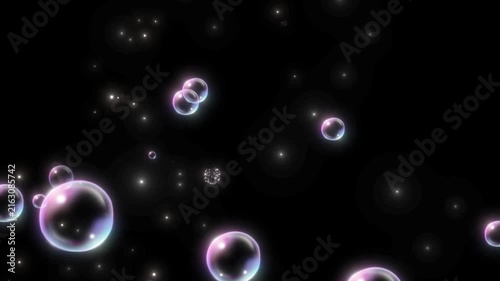 Soap bubbles float softly against a dark background.