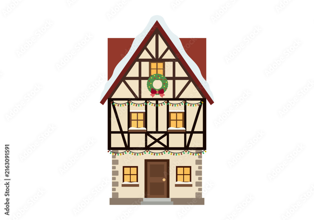 Fototapeta premium Casa tradicional de madera con tejado nevado corona navideña y luces