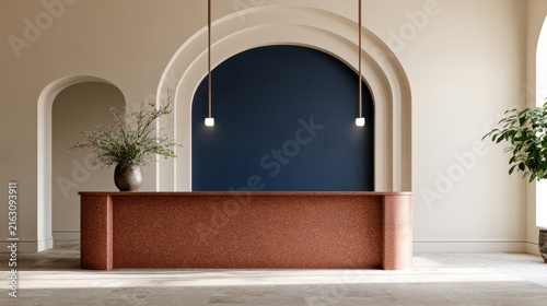 Modern reception area with terrazzo counter arched wall openings and hanging lights