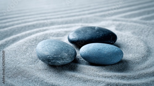 Calm Stones on Zen Sand in Minimalist Spa Setting for Relaxation