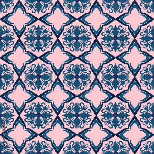 Ethnic ikat floral tile seamless pattern on pink background, oriental vector design