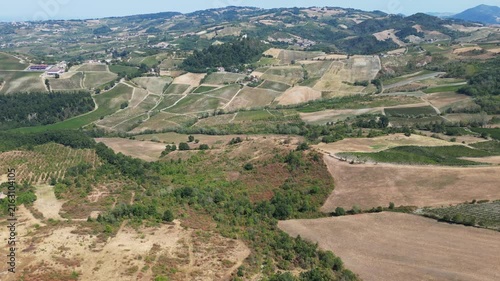 Europe, Italy, Lombardy, Pavia, Montù Berchielli – drone view of the Oltrepò Pavese hills; drought and water shortages lead to an early grape harvest for wine production. Global warming and climate ch