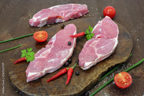 Lamb steak on the wooden plate