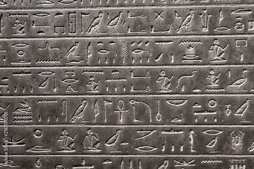 A stone artifact from ancient Egypt featuring hieroglyphics engraved in low relief