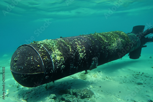 Submarine torpedo object wrech equipment at the bottom of the ocean deep underwater seabed