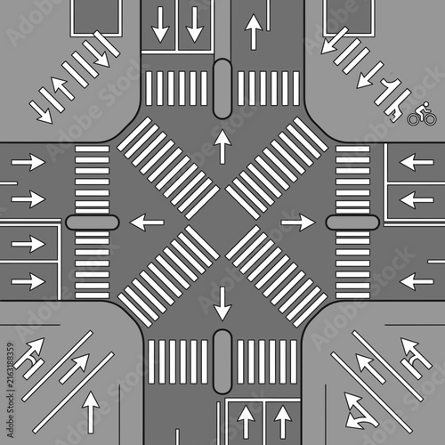 Urban intersection top view showing crosswalks and road direction arrows