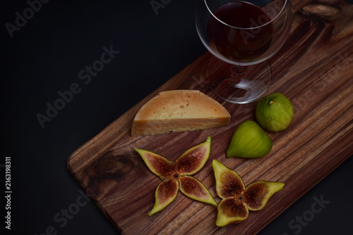 Still life with figs, cheese and wine