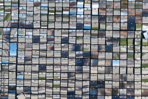 Foto Urban reflections create a mesmerizing mosaic of light and color in a vibrant ci
