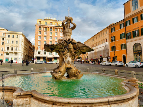 Rome, Italy - December 2021: Triton Fountain in barberini square in Rome Italy
