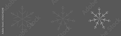 Minimalist white snowflake icons set with geometric line details isolated on grey background