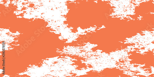Distressed grunge texture with orange blotches on a white background